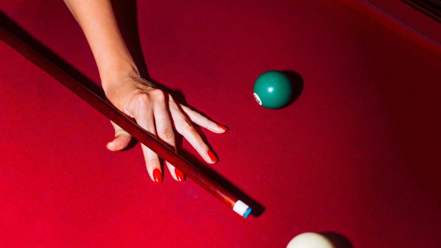 Red pool table and cue